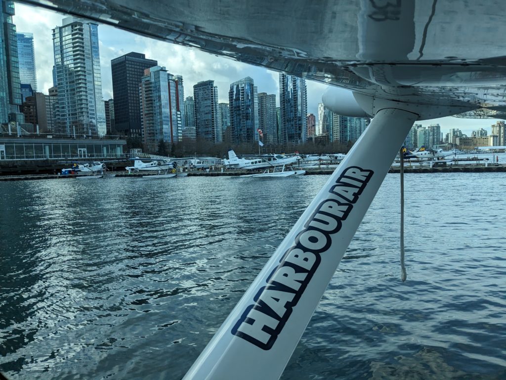 View of Vancouver's Coal Harbour neighbourhood from inside a float plane.
